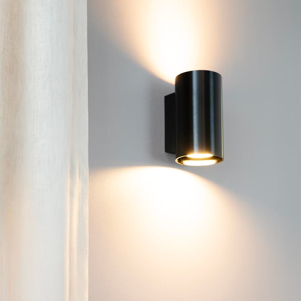 Giove notte nera by LUSENZ - Up and down licht met karakter - Cilindervormige wandlamp met een geborstelde zwarte coating | LUSENZ