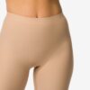 HEMA Medium corrigerende biker hoge taille beige (beige) | HEMA