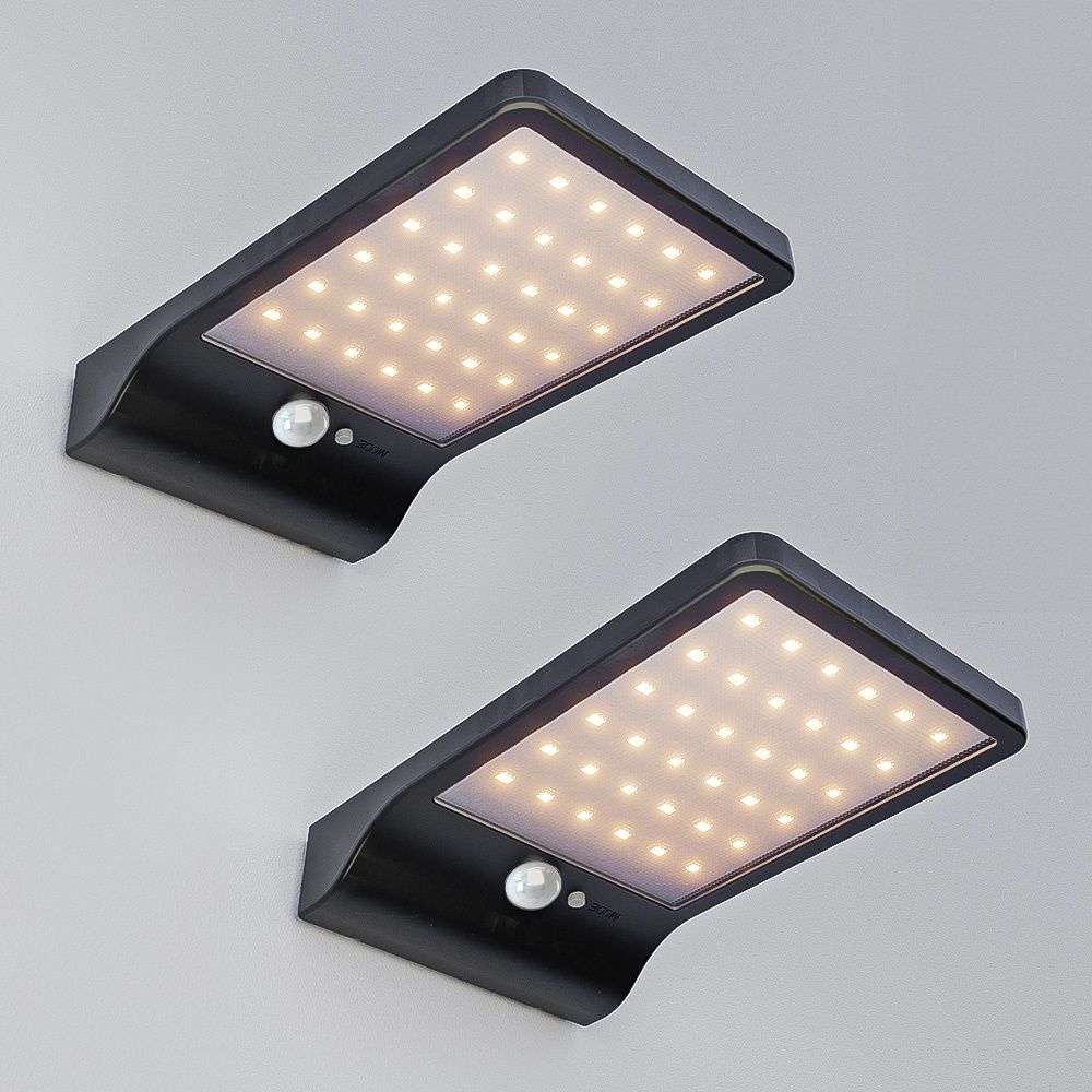 Set van 2 Macon - LED Solar Wandlampen - slim design - met PIR bewegingssensor - Zwart - Warm wit licht - 36 LEDs - IP44 | HOFTRONIC
