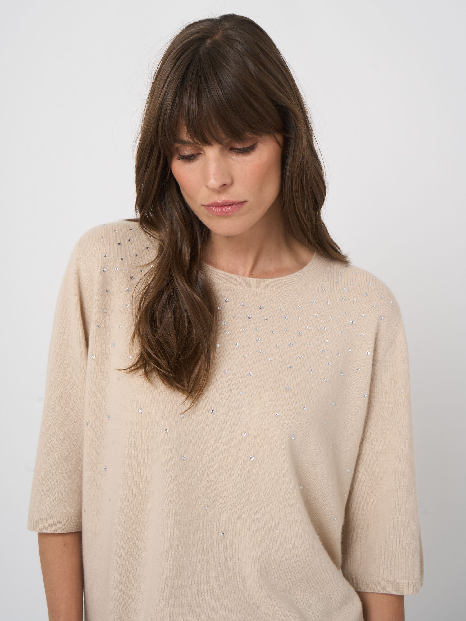 Biologische cashmere trui met subtiele hotfix