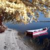 Glasschilderij boot op meer