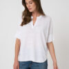 Lichte oversized linnen poncho met halssplit
