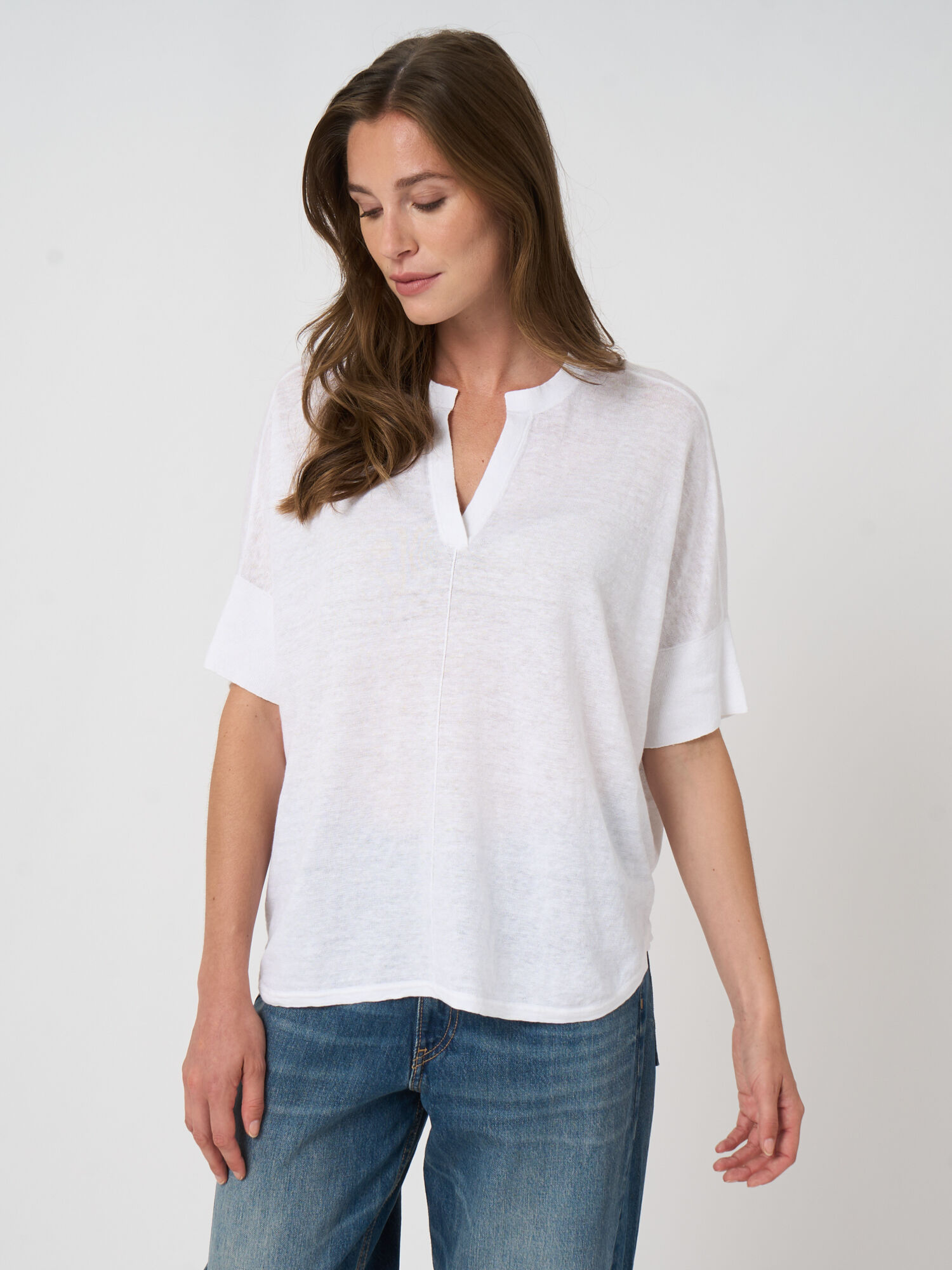 Lichte oversized linnen poncho met halssplit
