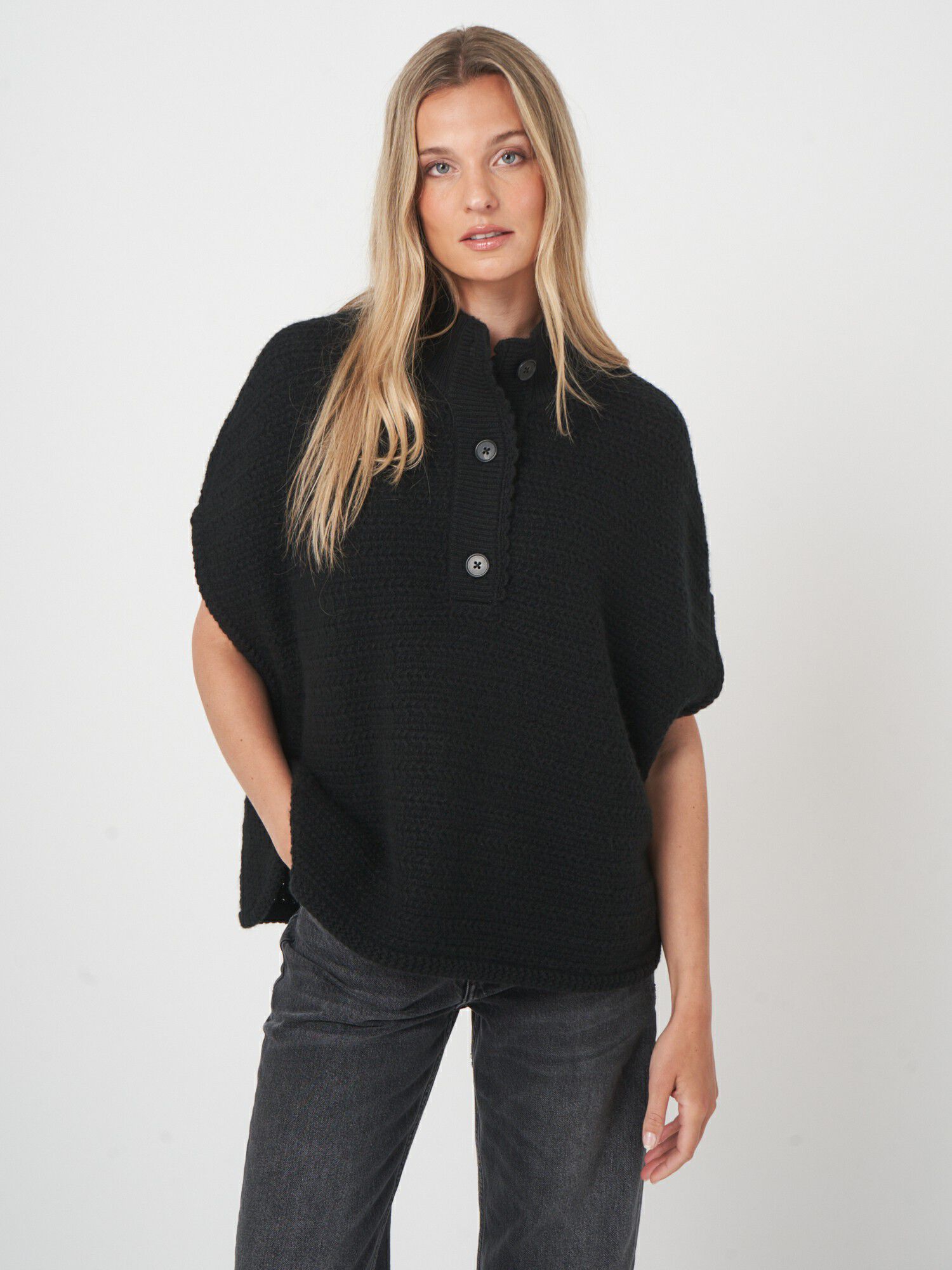 Luxe kasjmier poncho met textuur en losvallende pasvorm