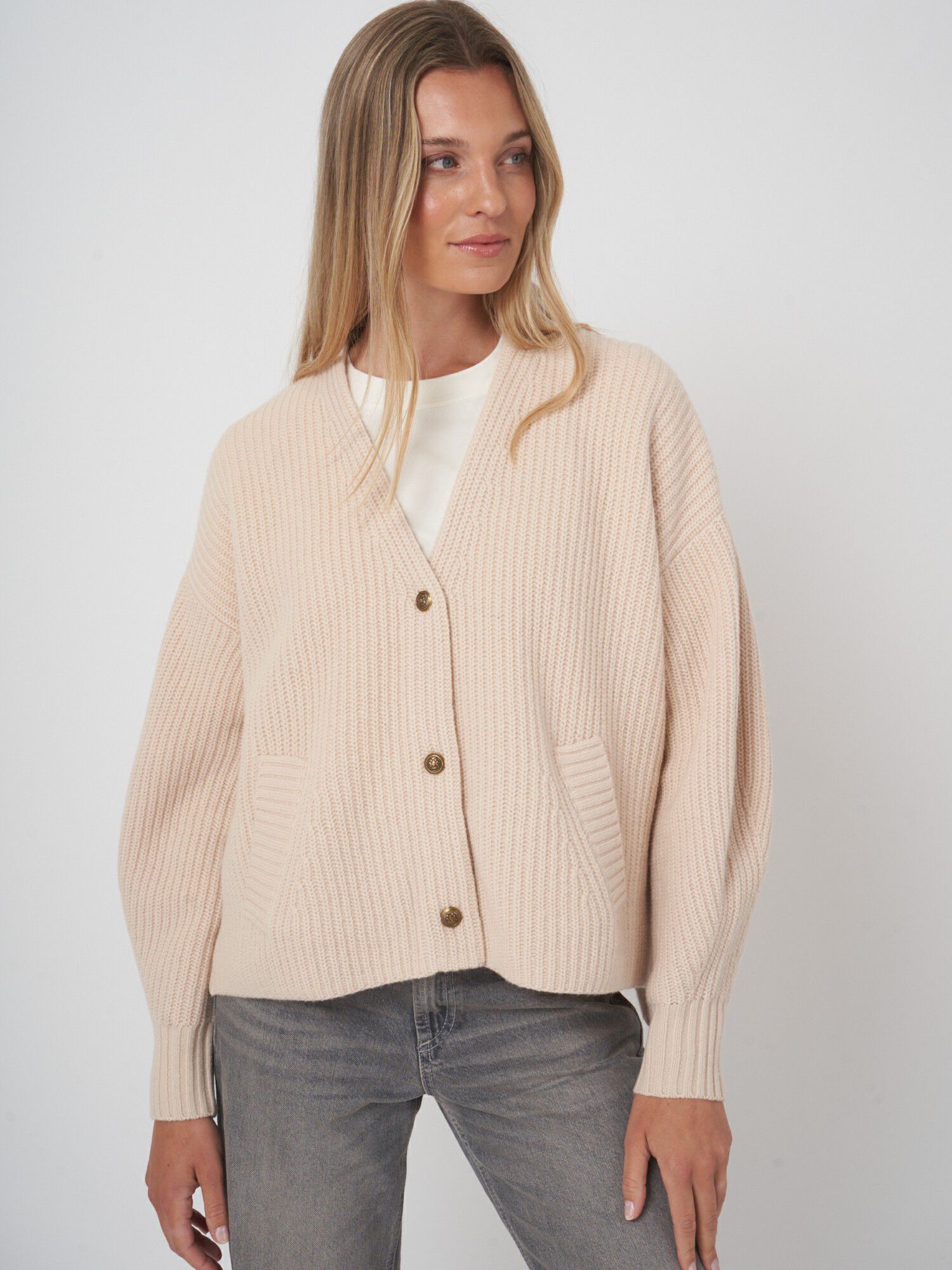 Oversized v-hals vest met functionele zakken