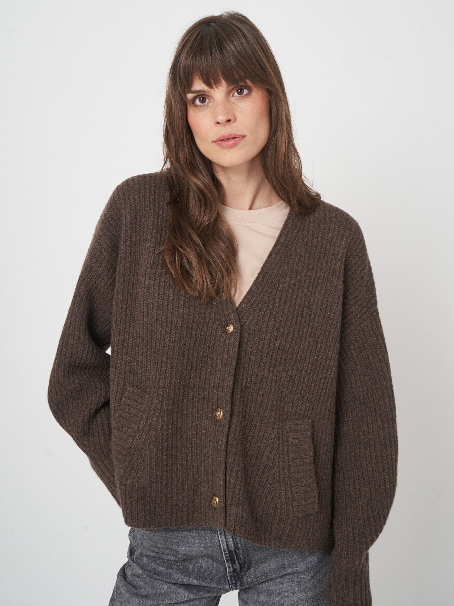 Oversized v-hals vest met functionele zakken